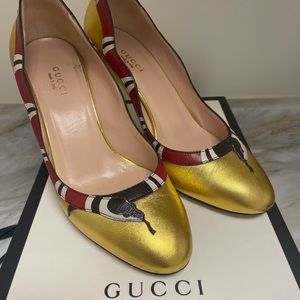 Authentic Gucci gold and snake heels size 6